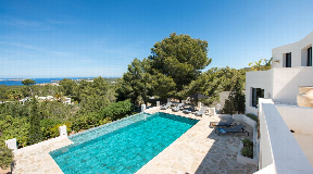 Five-bedroom villa in Cala Tarida with rental license and sea sunset views