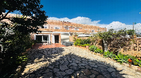 Elegant Triplex Townhouse with Private Garden in Es Vivé