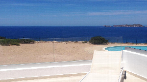 Beautifully Renovated Seafront Townhouse with Spectacular Sunset Views